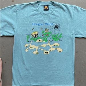 MEGA YACHT NEVER WORN “designer world” t-shirt.